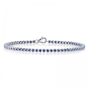 SC55026798 Bezel Tennis Bracelet In 14 Karat White Gold With Round Cut Sapphire