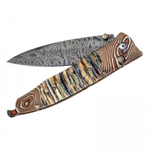The Gentac â€˜relicâ€™ Features A Beautiful Frame In Hand-forged Mokume Gane, Inlaid With 10,000 Year-old Fossil Woolly Mammoth Tooth. The Blade Is Hand-forged 